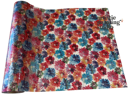 Metallic transfer foil with multiple colored daises