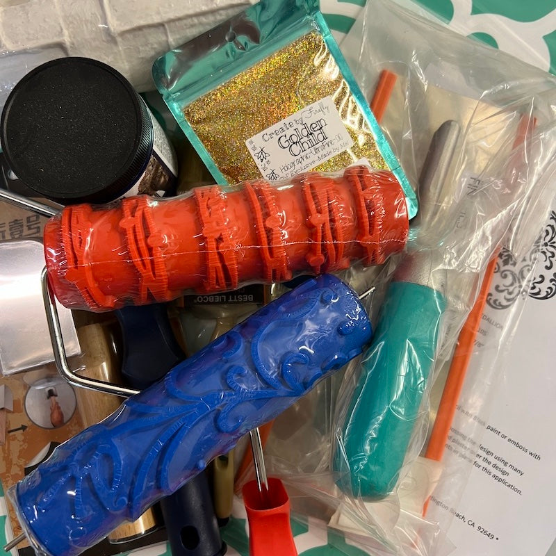 Image of possible products in the DIY mystery box. Rollers, foils, stencils, etc. 