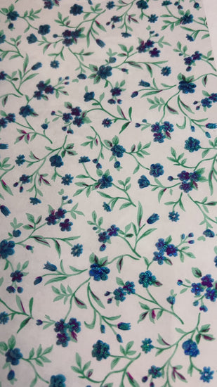 A video of a roll of blue floral transparent transfer foil